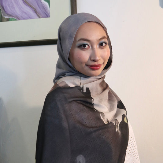 Women wearing black eco certified shawls from relilit gemalai collection